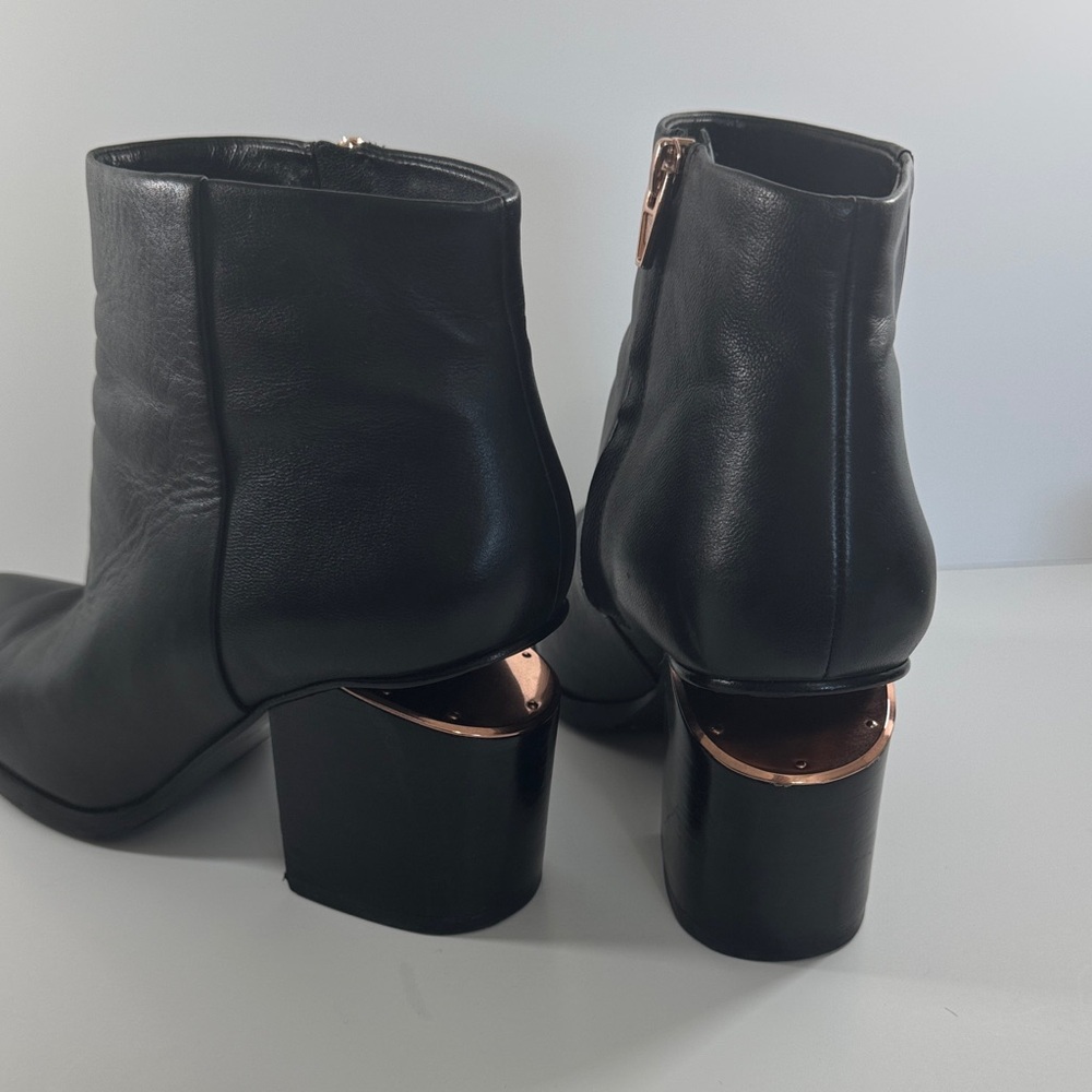 Alexander Wang Black Leather Ankle Booties with rose gold cutout heel